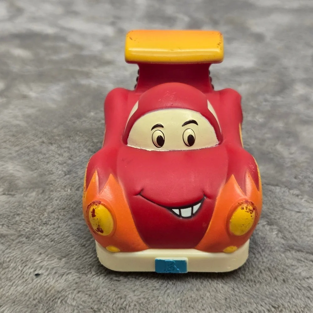 B. Toys Wheeee-ls! Red Race Car Flame Graphics Number 28 Soft Toy Vehicle